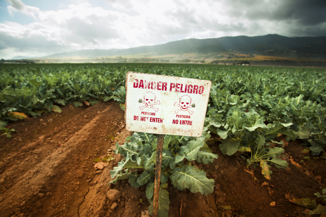 Poison pest control chemicals sprayed on a field in the Salinas Valley, California USA