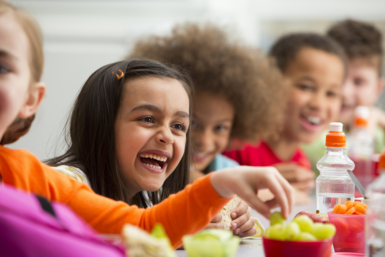 Young Students Enjoying Lunchtime At School