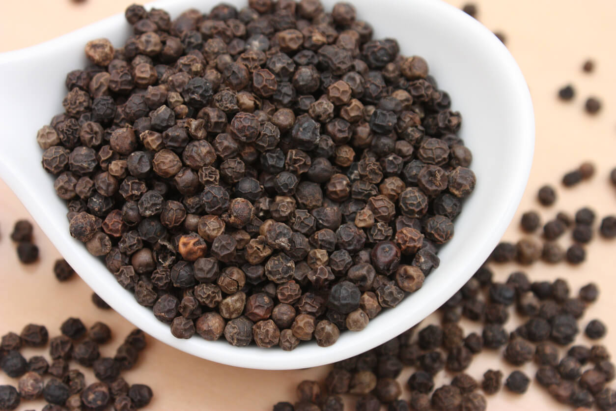 black pepper in a white bowl