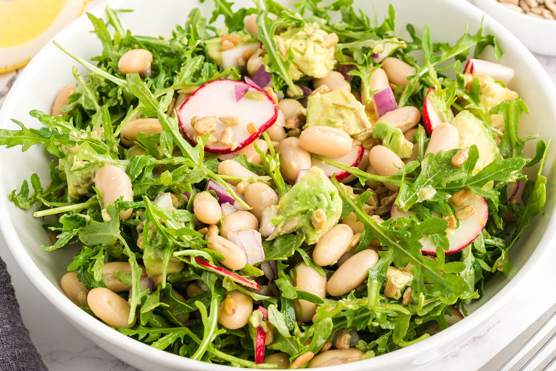 lemony arugula white bean and sunflower salad