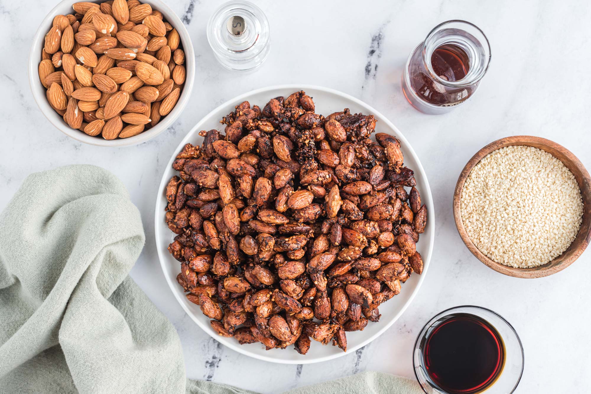 sesame coated almonds in bowl